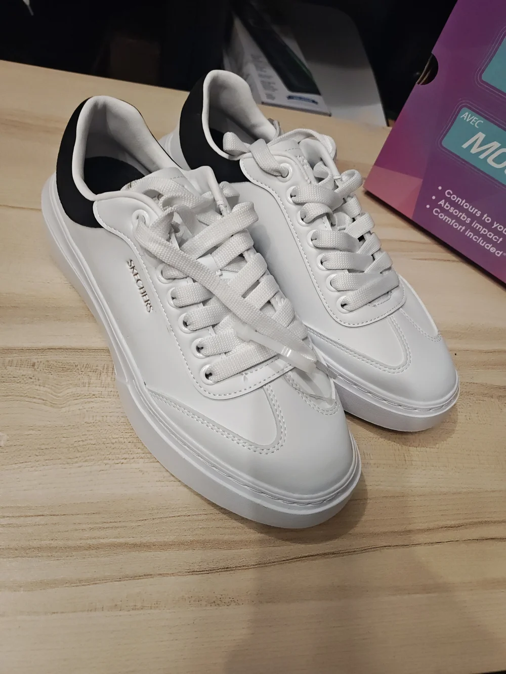 Skechers Men’s White Sneakers with Black Heel Accent 9